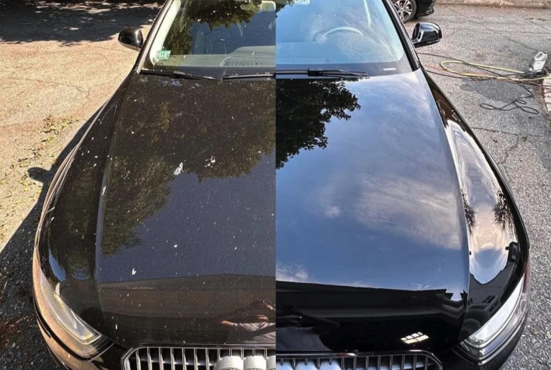 Split view of a black car hood, dusty on the left and mirror-clean on the right